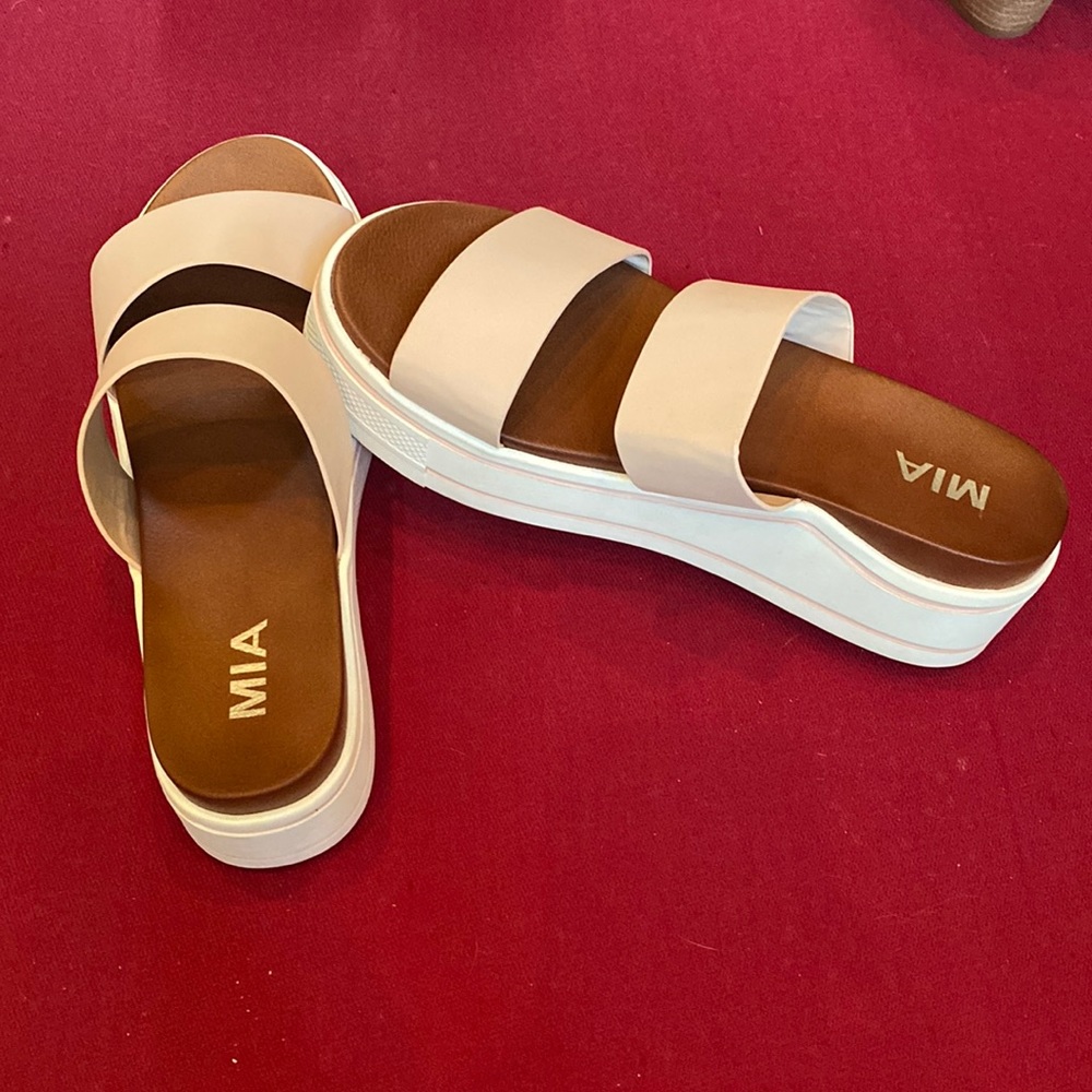 Mia Ozzie two strapped blush colored wedge sandals. Size 8.5.